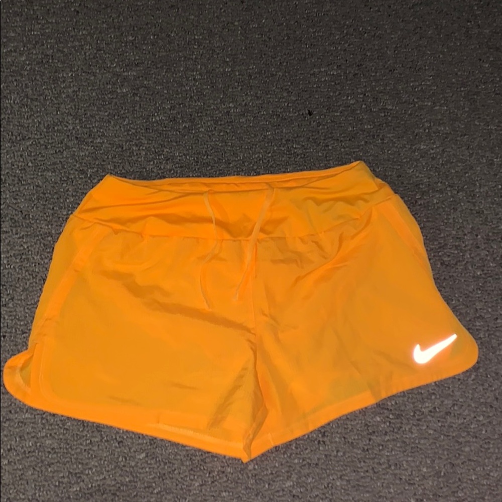 Orange nike shorts